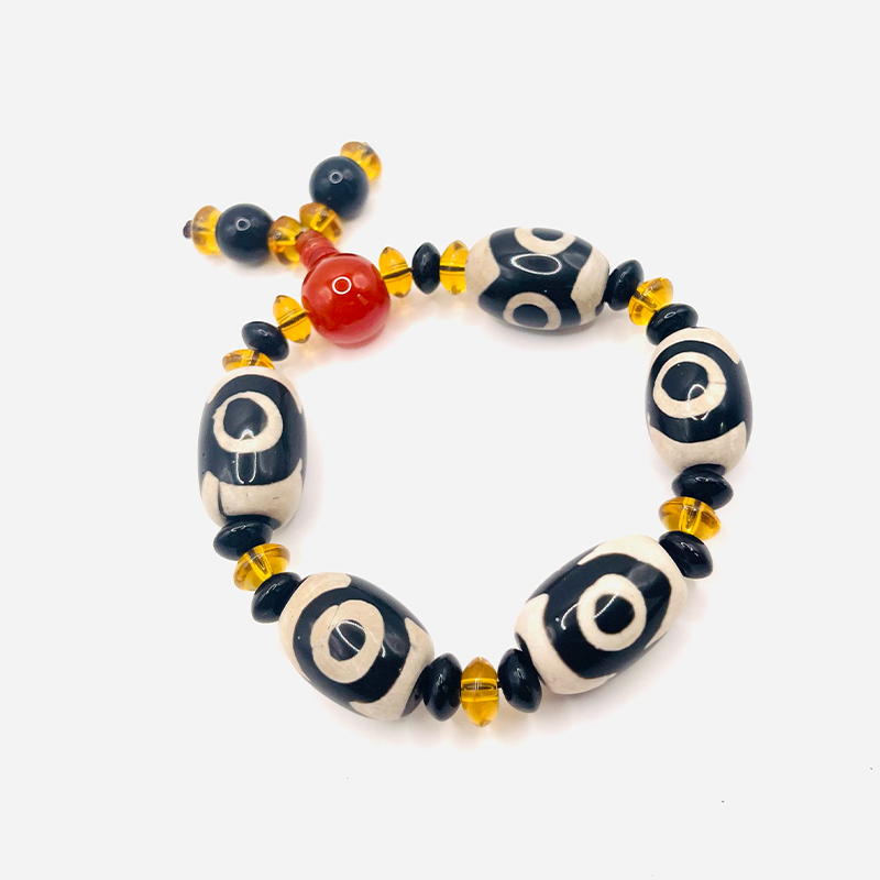 Pulsera de Dzi de 3 Ojos - riqueza - negro y blanco - Mundo Tibet