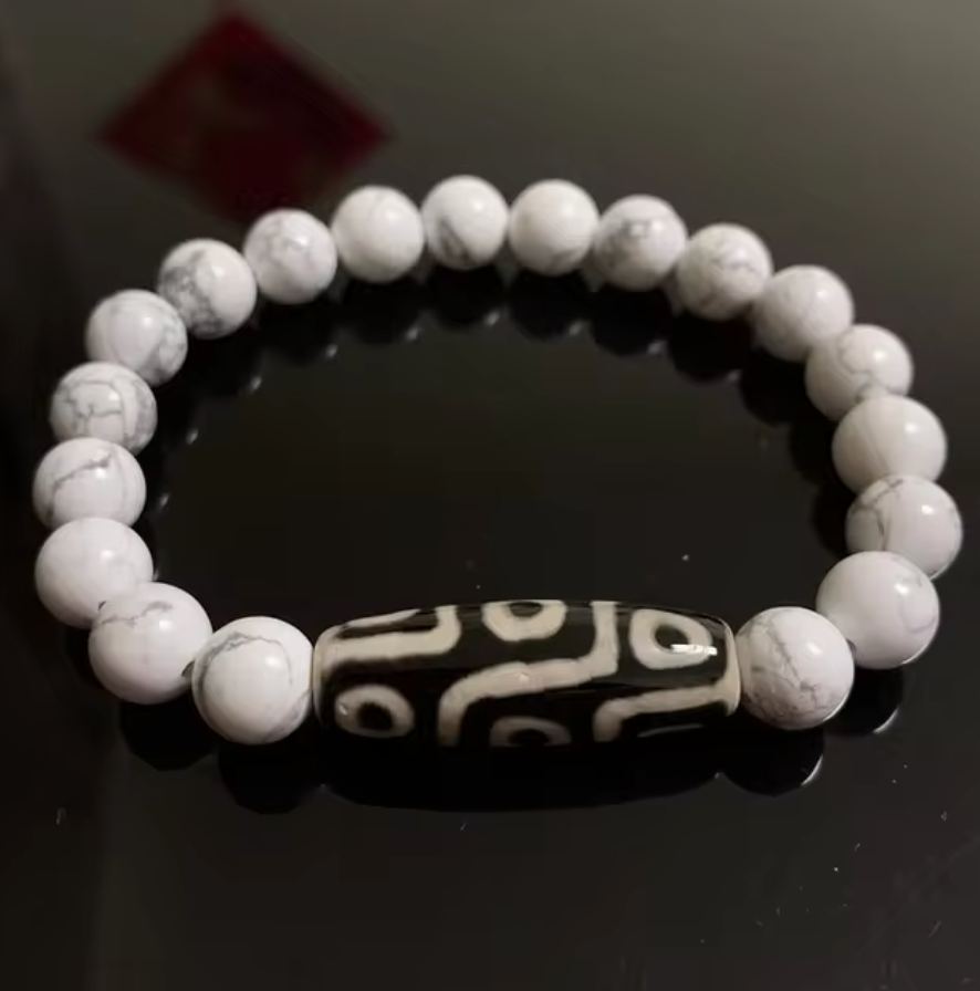 Pulsera de Dzi de 9 Ojos - Howlite - Mundo Tibet