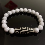 Pulsera de Dzi de 9 Ojos - Howlite - Mundo Tibet