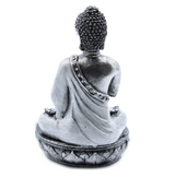 Estatuilla de Buda en Postura de Oración con Velas