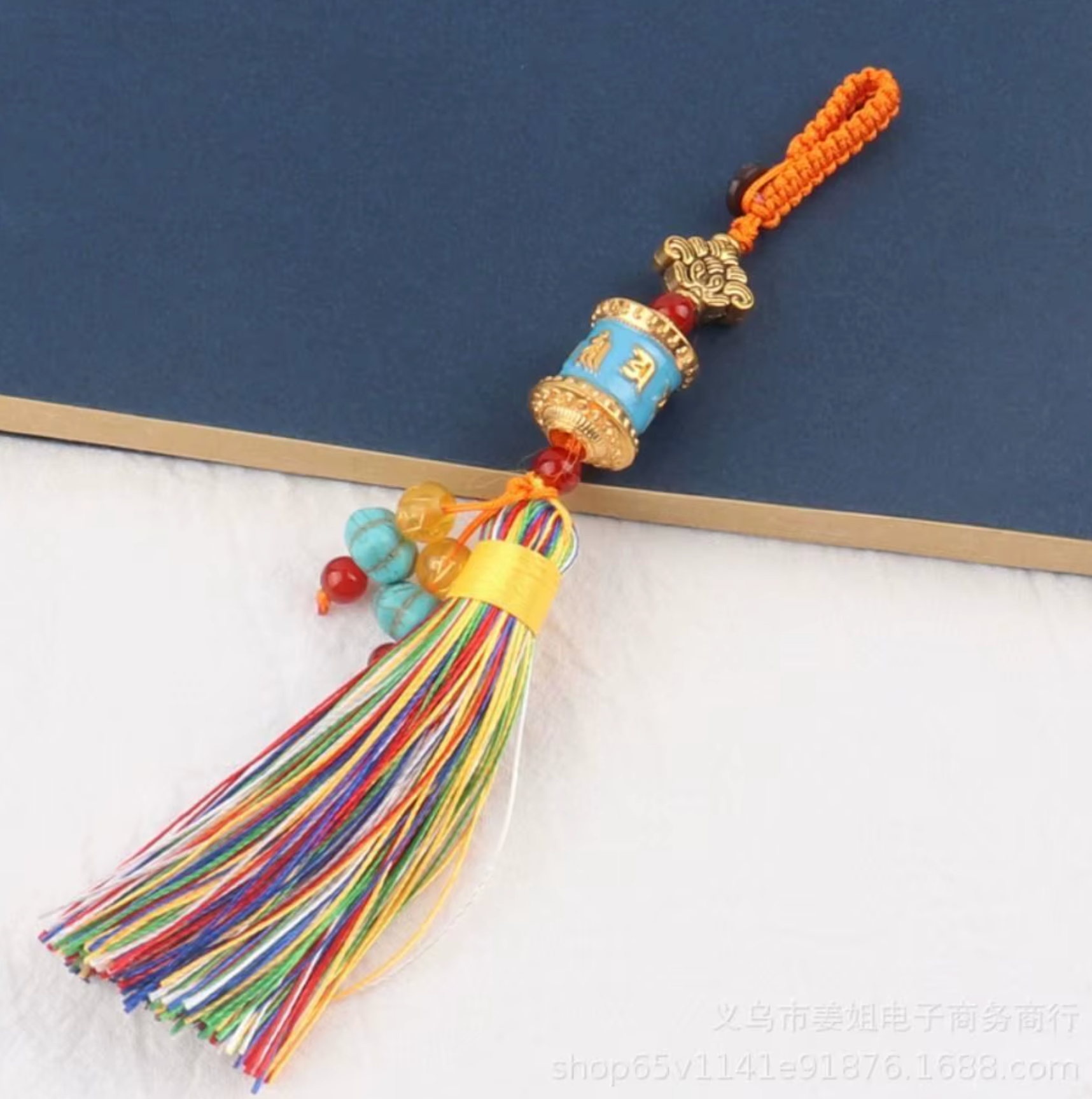 Llavero Rueda de Oración y Mantra Vajra con Pompon