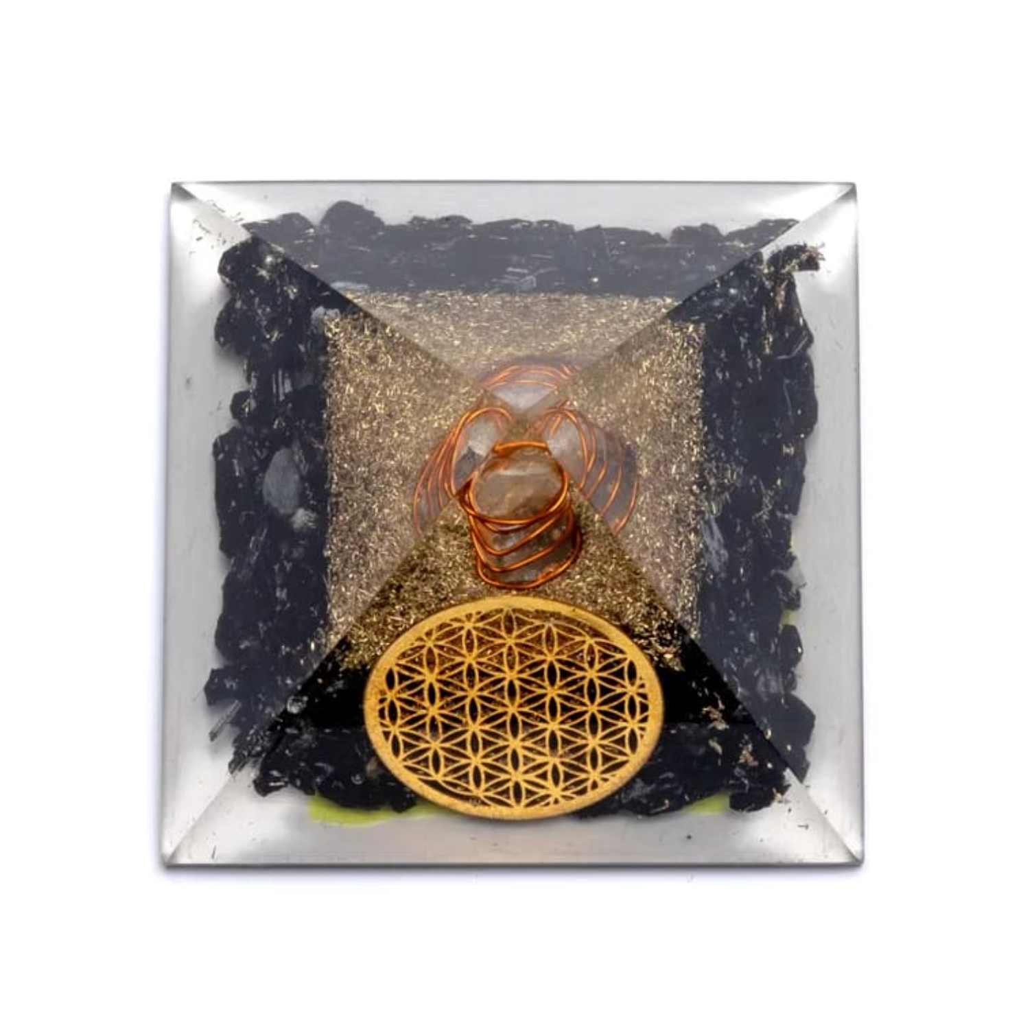Orgonite Tourmaline noire et cristal de roche avec motif Fleur de Vie et poignée métallique orangée, posé sur lit de gravier noir. Protection énergétique.