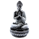 Estatuilla de Buda en la postura de oración con vela - Mundo Tibet