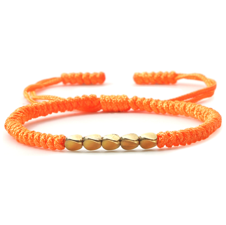 pulsera tibetana de buena suerte, hecha en oro con cuentas de cobre naranja - Mundo Tibet