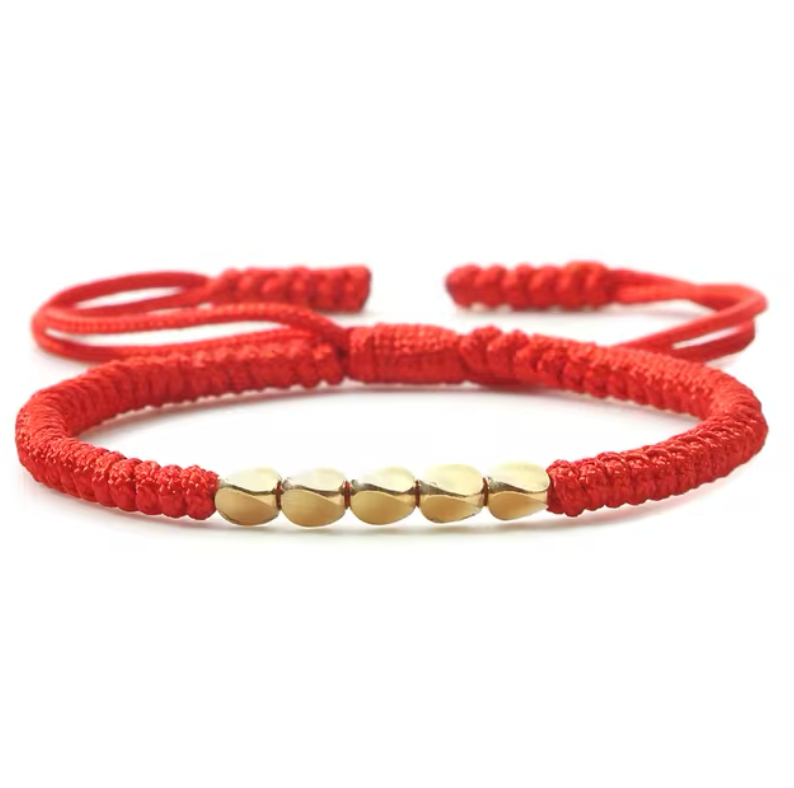 pulsera tibetana de buena suerte, hecha en oro con cuentas de cobre rojo - Mundo Tibet