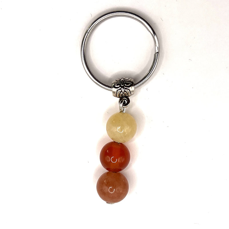 joya de llavero con piedras preciosas, citrina, coral, piedra de sol - Mundo Tibet